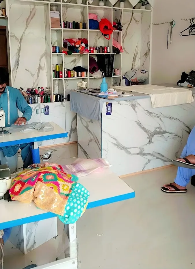 The counter and sewing machines inside the shop