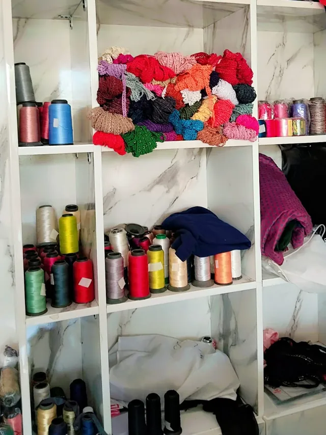 Thread reels on the shelves at MZ Tailors & Boutique